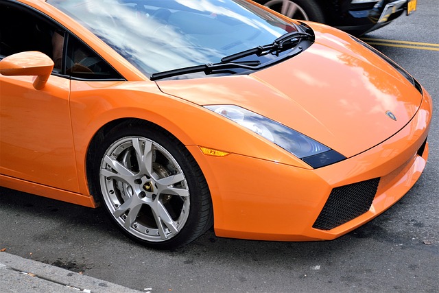 A bright orange Lamborghini parked on the side of the road in compliance with Illinois Windshield Tinting laws